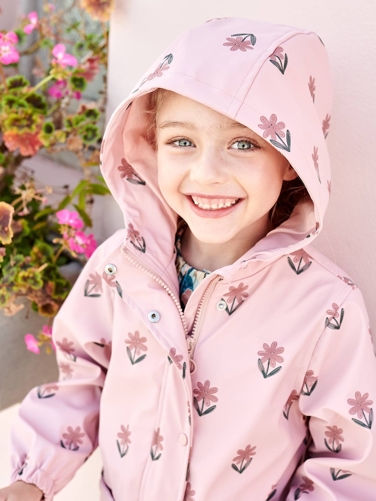 Pink raincoat store with hood